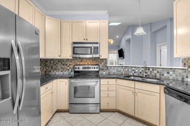 Nestled in the heart of the Magnolia Greens golf community, this on Magnolia Greens Golf Plantation in North Carolina - for sale on GolfHomes.com, golf home, golf lot