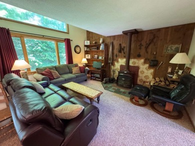 Enjoy four-season living in this inviting 2-bedroom, 1.5-bath on Hermitage Club Golf Course in Vermont - for sale on GolfHomes.com, golf home, golf lot