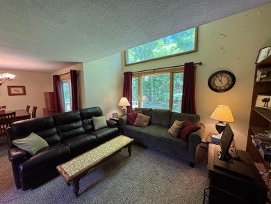 Enjoy four-season living in this inviting 2-bedroom, 1.5-bath on Hermitage Club Golf Course in Vermont - for sale on GolfHomes.com, golf home, golf lot