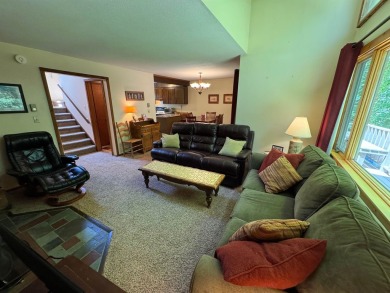 Enjoy four-season living in this inviting 2-bedroom, 1.5-bath on Hermitage Club Golf Course in Vermont - for sale on GolfHomes.com, golf home, golf lot