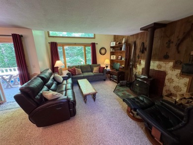 Enjoy four-season living in this inviting 2-bedroom, 1.5-bath on Hermitage Club Golf Course in Vermont - for sale on GolfHomes.com, golf home, golf lot