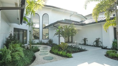 Located in Boca Grove, this charming remodel features a on Boca Grove Golf and Tennis in Florida - for sale on GolfHomes.com, golf home, golf lot