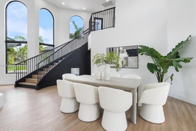 Located in Boca Grove, this charming remodel features a on Boca Grove Golf and Tennis in Florida - for sale on GolfHomes.com, golf home, golf lot