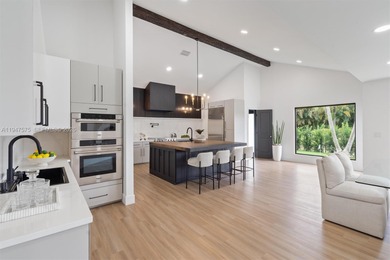 Located in Boca Grove, this charming remodel features a on Boca Grove Golf and Tennis in Florida - for sale on GolfHomes.com, golf home, golf lot