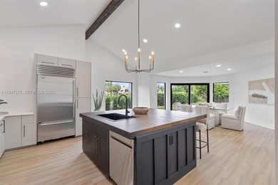 Located in Boca Grove, this charming remodel features a on Boca Grove Golf and Tennis in Florida - for sale on GolfHomes.com, golf home, golf lot