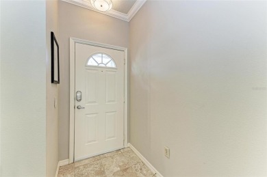 Discover the charm and convenience of this delightful two-story on University Park Country Club in Florida - for sale on GolfHomes.com, golf home, golf lot