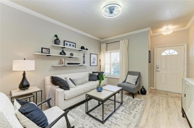 Discover the charm and convenience of this delightful two-story on University Park Country Club in Florida - for sale on GolfHomes.com, golf home, golf lot