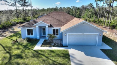 Better Than New! Stunning Home in Indian Lake Estates! Located on Indian Lake Estates Golf and Country Club in Florida - for sale on GolfHomes.com, golf home, golf lot