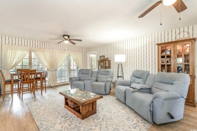 CHECK OUT THIS COZY LOW COUNTRY HOME!!!! This home sits on a on Wedgefield Plantation Golf Club in South Carolina - for sale on GolfHomes.com, golf home, golf lot