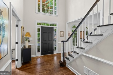 Nestled in the heart of Alpharetta this renovated home in on The Golf Club of Georgia in Georgia - for sale on GolfHomes.com, golf home, golf lot