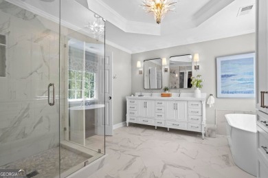 Nestled in the heart of Alpharetta this renovated home in on The Golf Club of Georgia in Georgia - for sale on GolfHomes.com, golf home, golf lot