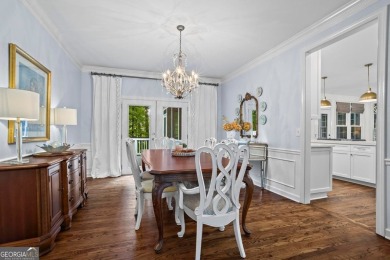 Nestled in the heart of Alpharetta this renovated home in on The Golf Club of Georgia in Georgia - for sale on GolfHomes.com, golf home, golf lot