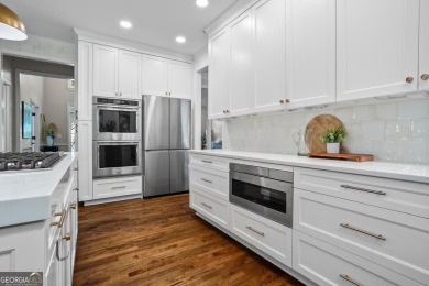Nestled in the heart of Alpharetta this renovated home in on The Golf Club of Georgia in Georgia - for sale on GolfHomes.com, golf home, golf lot