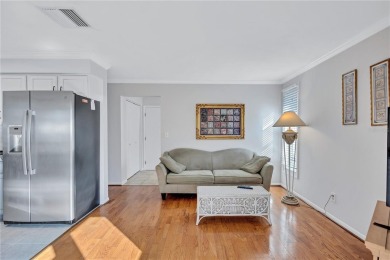 This elegant home features stunning hardwood floors throughout on Highland Lakes Executive Golf Course in Florida - for sale on GolfHomes.com, golf home, golf lot