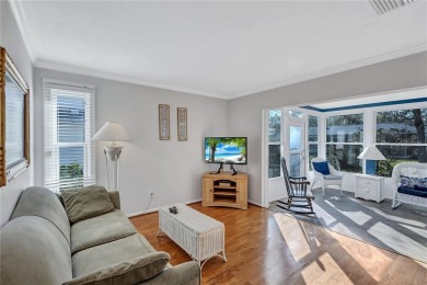 This elegant home features stunning hardwood floors throughout on Highland Lakes Executive Golf Course in Florida - for sale on GolfHomes.com, golf home, golf lot