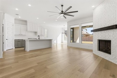 Welcome to luxury living in the prestigious, gated community of on The Golf Club at Resort Eagle Mountain Lake in Texas - for sale on GolfHomes.com, golf home, golf lot