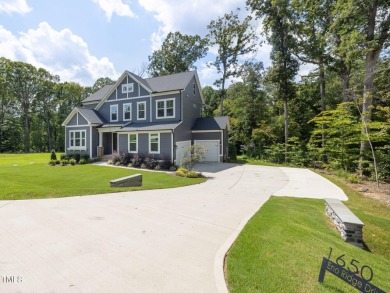 Newly painted and exquisitely designed home nestled in a small on Occoneechee Golf Club in North Carolina - for sale on GolfHomes.com, golf home, golf lot