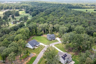 Newly painted and exquisitely designed home nestled in a small on Occoneechee Golf Club in North Carolina - for sale on GolfHomes.com, golf home, golf lot