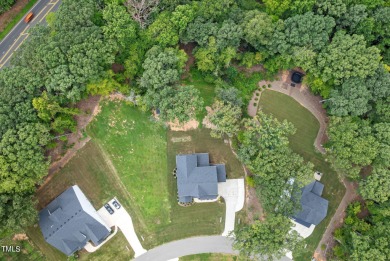 Newly painted and exquisitely designed home nestled in a small on Occoneechee Golf Club in North Carolina - for sale on GolfHomes.com, golf home, golf lot