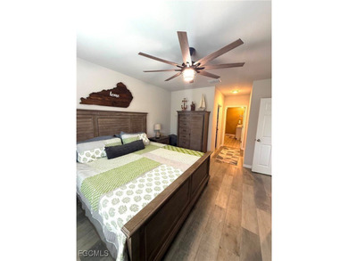 Located within the Magnolia Landing community, this residence on Herons Glen Golf and Country Club in Florida - for sale on GolfHomes.com, golf home, golf lot