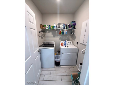 Located within the Magnolia Landing community, this residence on Herons Glen Golf and Country Club in Florida - for sale on GolfHomes.com, golf home, golf lot