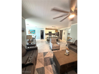 Located within the Magnolia Landing community, this residence on Herons Glen Golf and Country Club in Florida - for sale on GolfHomes.com, golf home, golf lot