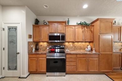MLS# 284759 Welcome to 4222 W 32nd Ave, an elegant Tuscan-style on Canyon Lakes Golf Course in Washington - for sale on GolfHomes.com, golf home, golf lot