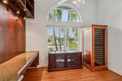 Set within the prestigious private gated community of Lakefield on The Wanderers Club in Florida - for sale on GolfHomes.com, golf home, golf lot