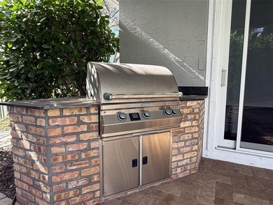 Set within the prestigious private gated community of Lakefield on The Wanderers Club in Florida - for sale on GolfHomes.com, golf home, golf lot