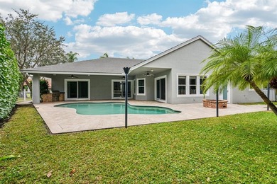 Set within the prestigious private gated community of Lakefield on The Wanderers Club in Florida - for sale on GolfHomes.com, golf home, golf lot