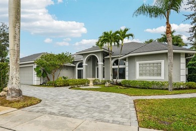 Set within the prestigious private gated community of Lakefield on The Wanderers Club in Florida - for sale on GolfHomes.com, golf home, golf lot