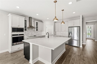 Luxurious 5 bed 3.5 bath home with a generous loft and 2 Car on Kings Ridge Golf Club in Florida - for sale on GolfHomes.com, golf home, golf lot