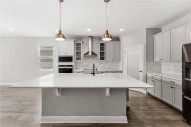 Luxurious 5 bed 3.5 bath home with a generous loft and 2 Car on Kings Ridge Golf Club in Florida - for sale on GolfHomes.com, golf home, golf lot