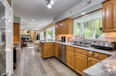 This 5-bedroom, 4.5-bath Colonial-style home offers 3,500 square on Whiteface Club and Resort in New York - for sale on GolfHomes.com, golf home, golf lot