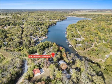 This lake front home is in the sought after Sugar Valley Lakes on Sugar Valley Lakes Golf Course in Kansas - for sale on GolfHomes.com, golf home, golf lot