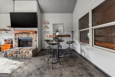 Welcome to this stunning ranch-style home in the highly on Traditions of Braselton Golf Club in Georgia - for sale on GolfHomes.com, golf home, golf lot