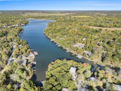 This lake front home is in the sought after Sugar Valley Lakes on Sugar Valley Lakes Golf Course in Kansas - for sale on GolfHomes.com, golf home, golf lot