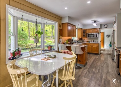 This 5-bedroom, 4.5-bath Colonial-style home offers 3,500 square on Whiteface Club and Resort in New York - for sale on GolfHomes.com, golf home, golf lot