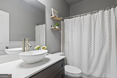 Welcome to this stunning ranch-style home in the highly on Traditions of Braselton Golf Club in Georgia - for sale on GolfHomes.com, golf home, golf lot