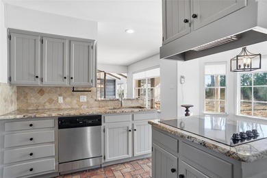 ONE STORY ENGLISH TUDOR SYLE HOME, LOCATED IN SOUGHT AFTER on Woodhaven Country Club in Texas - for sale on GolfHomes.com, golf home, golf lot