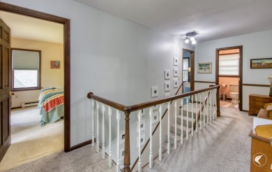 This 5-bedroom, 4.5-bath Colonial-style home offers 3,500 square on Whiteface Club and Resort in New York - for sale on GolfHomes.com, golf home, golf lot