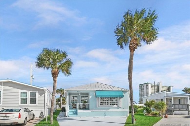 Gorgeous, light-filled open concept single story frame stucco on Island Dunes Country Club in Florida - for sale on GolfHomes.com, golf home, golf lot
