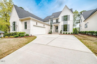 Outstanding North Ridge Custom Home with views of the Golf on North Ridge Country Club in North Carolina - for sale on GolfHomes.com, golf home, golf lot