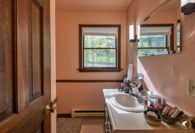 This 5-bedroom, 4.5-bath Colonial-style home offers 3,500 square on Whiteface Club and Resort in New York - for sale on GolfHomes.com, golf home, golf lot