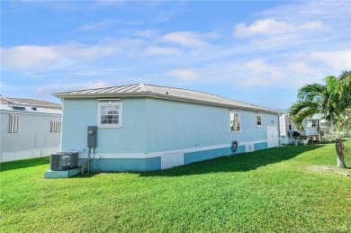 Gorgeous, light-filled open concept single story frame stucco on Island Dunes Country Club in Florida - for sale on GolfHomes.com, golf home, golf lot