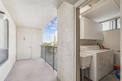 Welcome to this stunning, move-in-ready, FULLY FURNISHED dream on Cove Cay Country Club in Florida - for sale on GolfHomes.com, golf home, golf lot