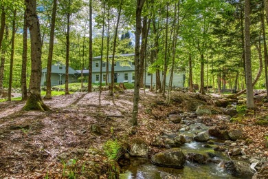 This 5-bedroom, 4.5-bath Colonial-style home offers 3,500 square on Whiteface Club and Resort in New York - for sale on GolfHomes.com, golf home, golf lot