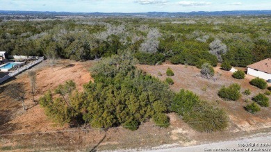 Beautiful level lot located in Rockin' J Ranch that backs up to on Vaaler Creek Golf Club in Texas - for sale on GolfHomes.com, golf home, golf lot