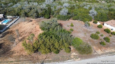 Beautiful level lot located in Rockin' J Ranch that backs up to on Vaaler Creek Golf Club in Texas - for sale on GolfHomes.com, golf home, golf lot