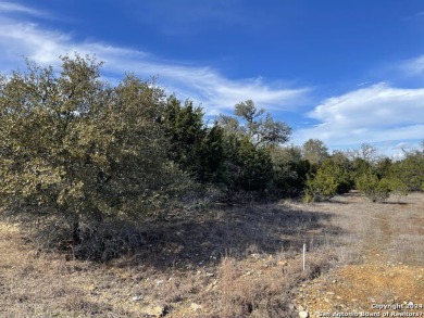 Beautiful level lot located in Rockin' J Ranch that backs up to on Vaaler Creek Golf Club in Texas - for sale on GolfHomes.com, golf home, golf lot